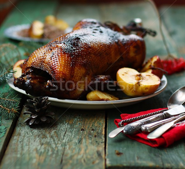 the Christmas baked goose with apples Stock photo © zoryanchik