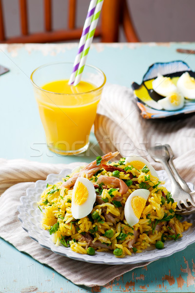 Kedgeree with a smoked mackerel. Stock photo © zoryanchik