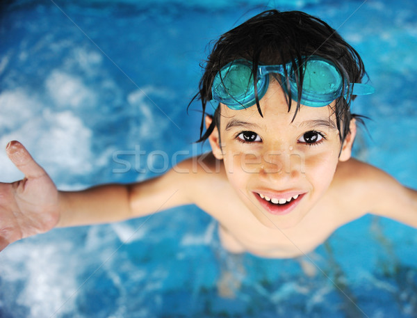 Nyáridő úszik tevékenységek boldog gyerekek medence Stock fotó © zurijeta