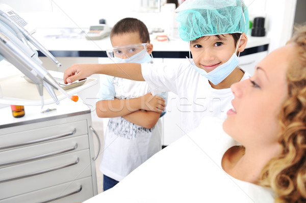 Child Dentist's teeth checkup, series of related photos Stock photo © zurijeta