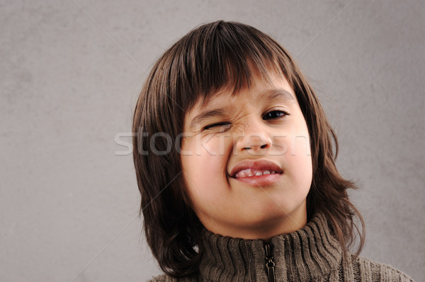 Iskolás fiú okos gyerek évek öreg arckifejezések Stock fotó © zurijeta