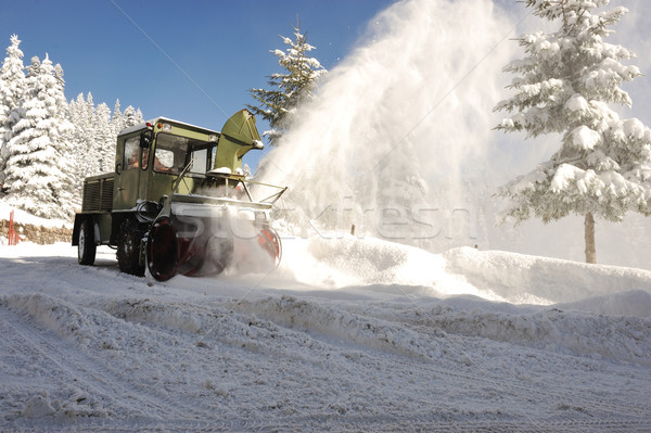 Special winter vehicle for removing snow from road in action Stock photo © zurijeta
