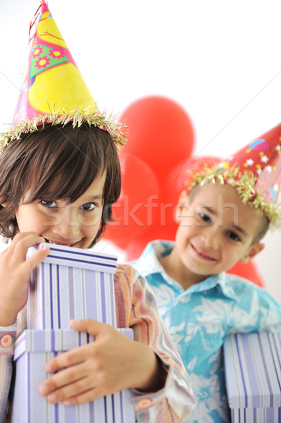 Birthday party, happy children celebrating, balloons and presents around Stock photo © zurijeta