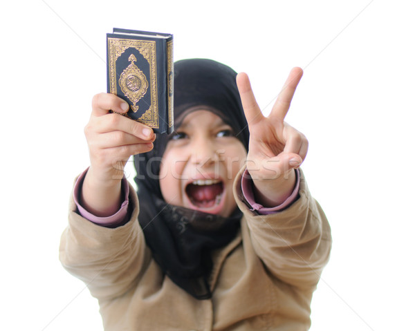 Muslim girl - intifada girl with Koran Stock photo © zurijeta