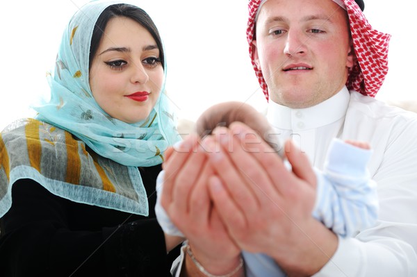 Arabic Muslim couple with new baby at home Stock photo © zurijeta