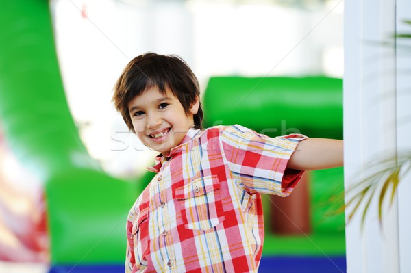 Kids playing on colorful kindergarden playground Stock photo © zurijeta