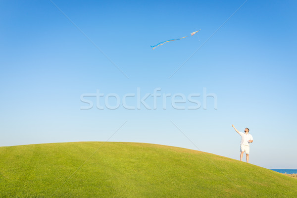 Stock photo: Running with kite on summer holiday vacation, perfect meadow and