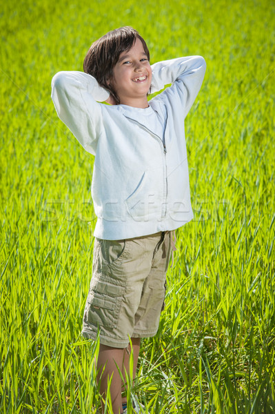 快樂 孩子 美麗 綠色 黃色 草地 商業照片 © zurijeta