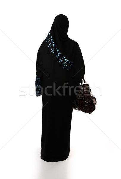 Muslim traditional woman with shopping bag, clothes from back, isolated Stock photo © zurijeta