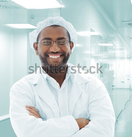 Working people with white uniforms in modern facility Stock photo © zurijeta