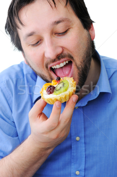Adult man eating delicious cake Stock photo © zurijeta
