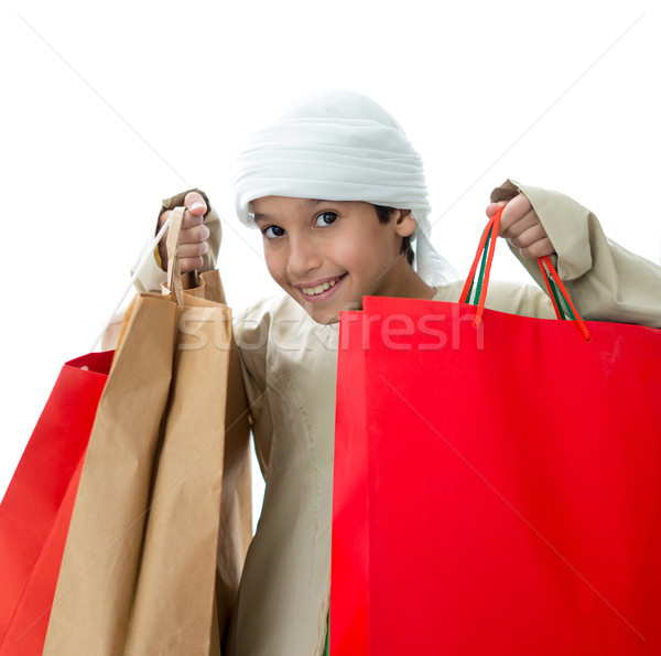 Arabic kid with shopping bags Stock photo © zurijeta
