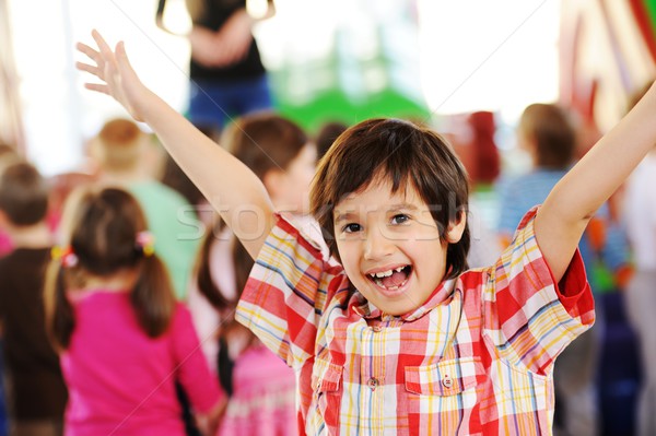 Kids playing on colorful kindergarden playground Stock photo © zurijeta