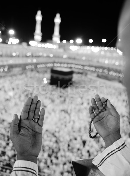 Muslim praying at Mekkah with hands up Stock photo © zurijeta