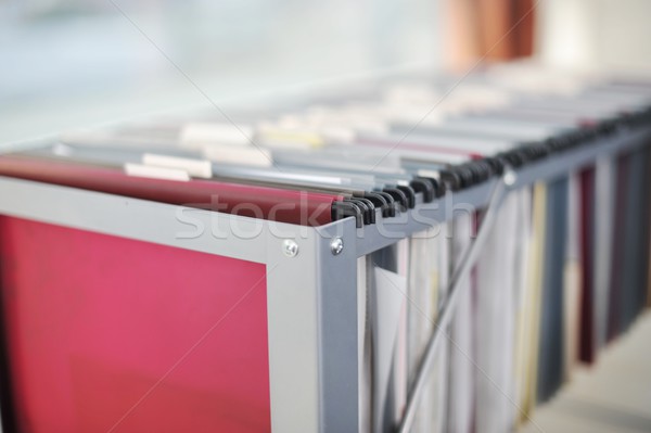 Files and documents organized and arrayed in shelves Stock photo © zurijeta