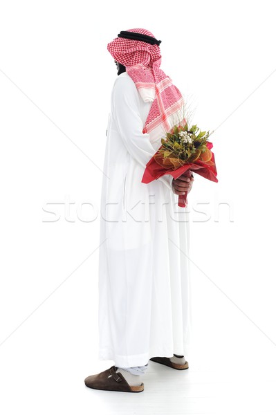 Middle eastern man hides behind a roses for his wife Stock photo © zurijeta