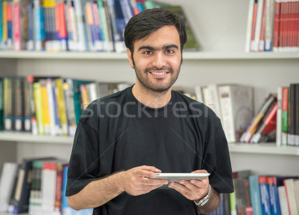 Happy young Middle eastern students studying in college library  Stock photo © zurijeta
