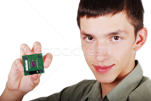 Young male holding computer processor Stock photo © zurijeta