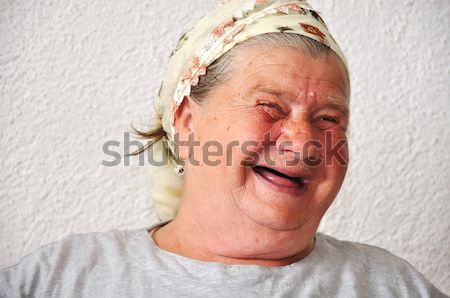 Old aged female person, very delightful and funny face Stock photo © zurijeta