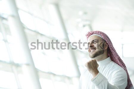 Modern Arabic businessman inside airplane Stock photo © zurijeta