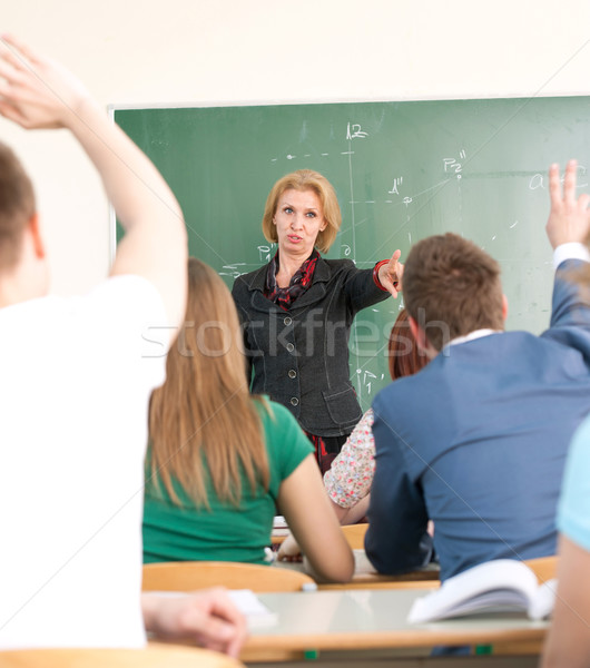 Profesor wskazując palec edukacji studentów portret Zdjęcia stock © zurijeta
