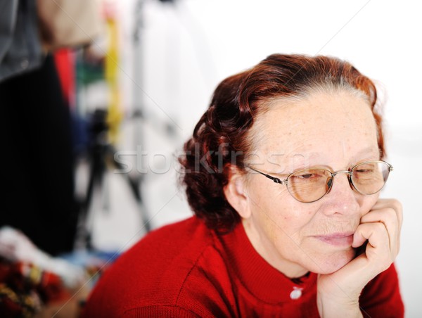 Orta yaşlı kadın portre üzücü serin düşünmek gülen Stok fotoğraf © zurijeta