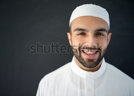 Atraente árabe homem moço posando Foto stock © zurijeta