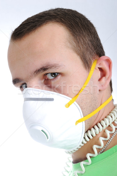 Man with mask and wires on his neck Stock photo © zurijeta