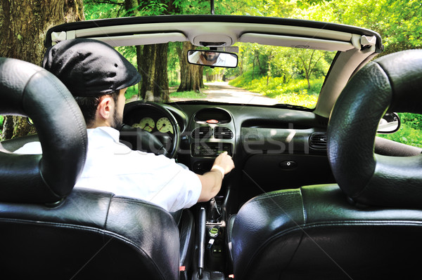 Photo inside of a sports car driving through park Stock photo © zurijeta