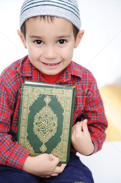 Muslim kid with holy book Koran Stock photo © zurijeta
