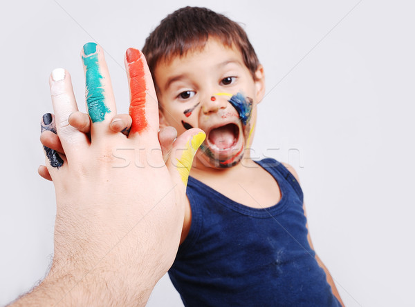 Pequeno bonitinho criança cores cara mãos Foto stock © zurijeta
