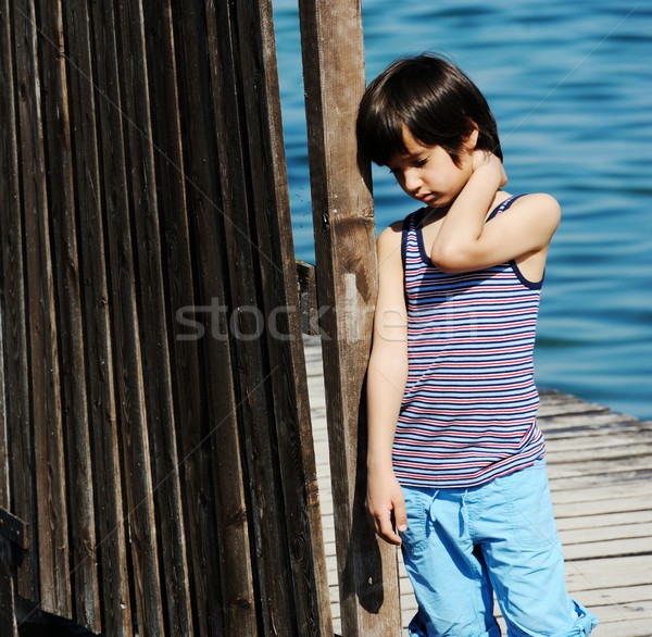 Wenig Junge Fuß Dock schönen Meer Stock foto © zurijeta