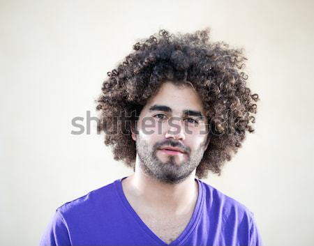 Bonito moço cabelos cacheados jovem homem bonito cidade Foto stock © zurijeta