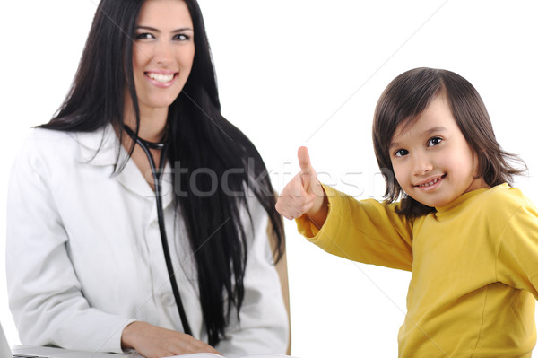 Jóvenes femenino médico examinar pequeño cute Foto stock © zurijeta