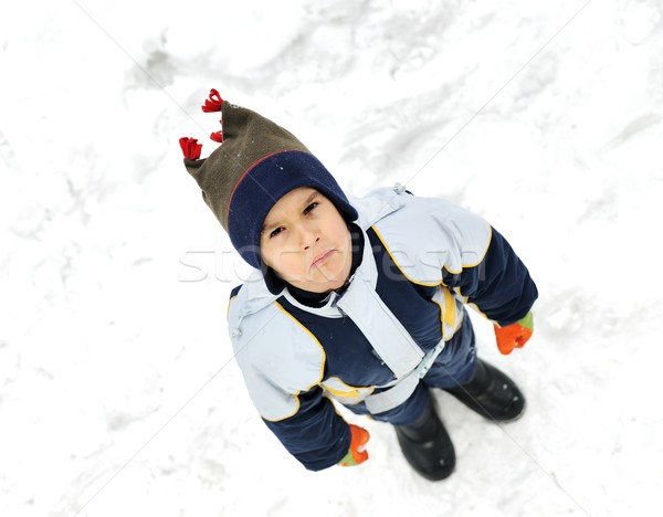 Happy kid on snow Stock photo © zurijeta