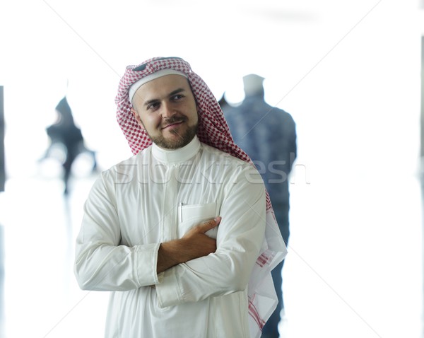 Modern Arabic businessman inside airplane Stock photo © zurijeta