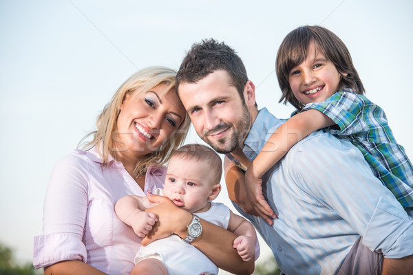 Happy family posing Stock photo © zurijeta