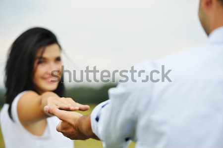 Young loving couple engaged in nature Stock photo © zurijeta