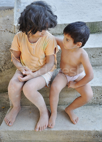 Sărăcie copii familie copil trist portret Imagine de stoc © zurijeta