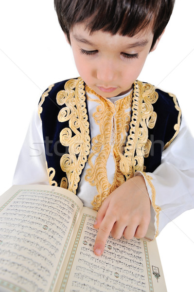 Muslim kid reading Quran Stock photo © zurijeta