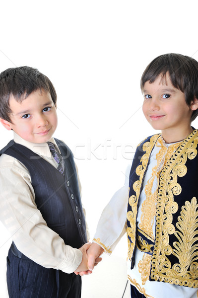 Two brothers shaking hands Stock photo © zurijeta