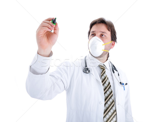 Stock photo: Young male doctor with a mask isolated