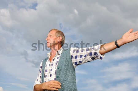 Senior male person making gestures Stock photo © zurijeta