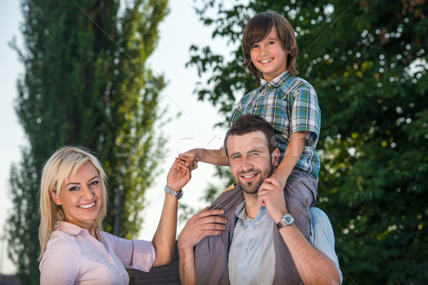 Smiling family posing Stock photo © zurijeta