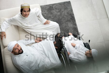 Stock photo: Attractive Arab man in the car on street