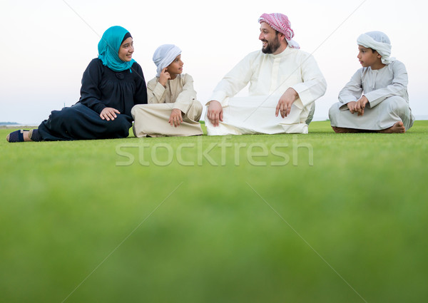Happy Muslim Arabic family on summer vacation Stock photo © zurijeta