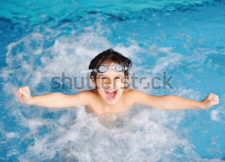 Stock photo: Activities on the pool, children swimming and playing in water, happiness and summertime