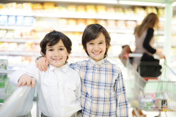 Two beautiful kids in shopping mall Stock photo © zurijeta