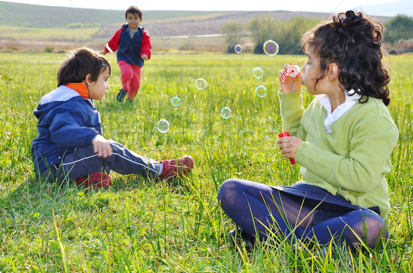 Stockfoto: Spelen · bubbels · weide · voorjaar · glimlach · gelukkig