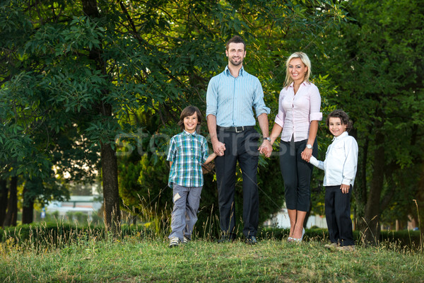 Young couple with two kids Stock photo © zurijeta